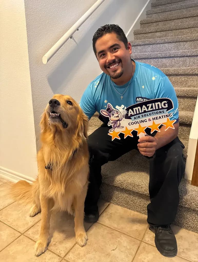 Amazing Air Solutions technician with a friendly dog — trusted in your home